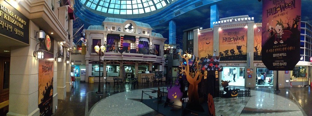 Another angle of the hall with a Parents Lounge sign and Halloween cutouts